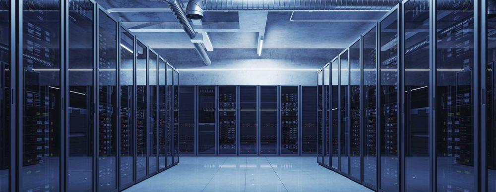 Rows of server racks in a data centre, illustrating the infrastructure behind Optuma’s data services